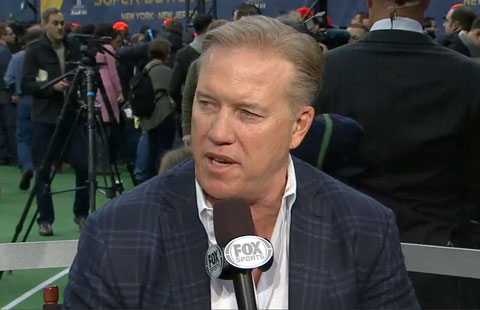 Photo shows John Elway speaking with FOX Super Bowl Daily on January 28, 2014, about Super Bowl XLVIII.